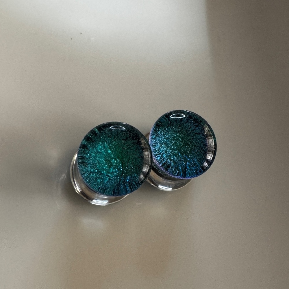 Blue and Green Glass Plugs